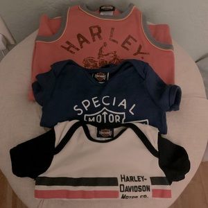 Like new set of 3 Harley Davidson onesies. Black, orange, cream & blue.